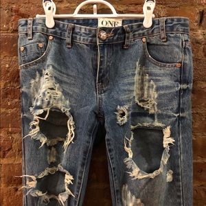 Distressed jeans.